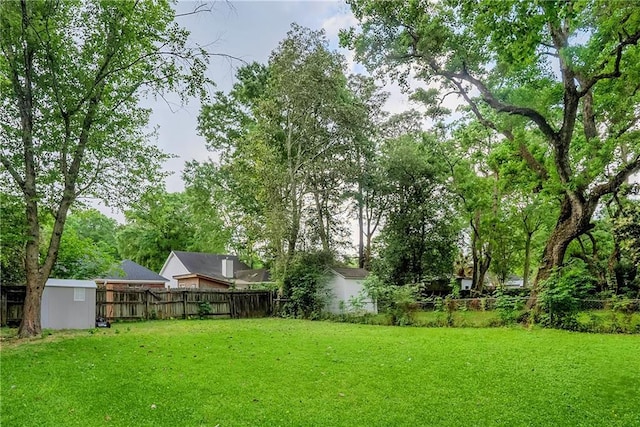view of yard with fence