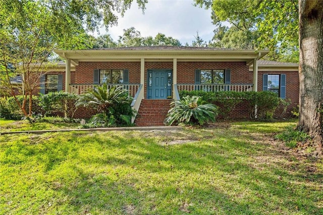 single story home featuring a porch and a front yard