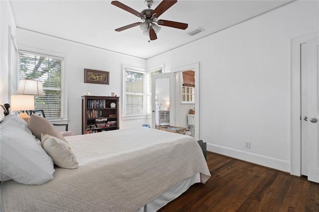 1910 Hunter Ave, Mobile, AL 36606 - bedroom with wood finished floors, baseboards, multiple windows, and ceiling fan