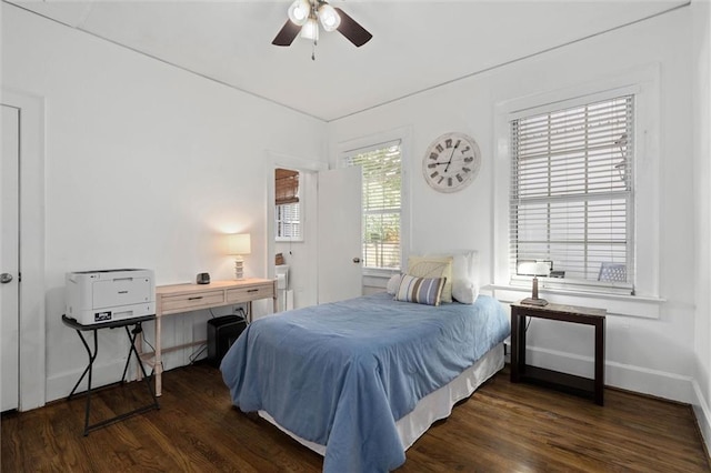 1910 Hunter Ave, Mobile, AL 36606 - bedroom with dark wood finished floors, baseboards, and a ceiling fan