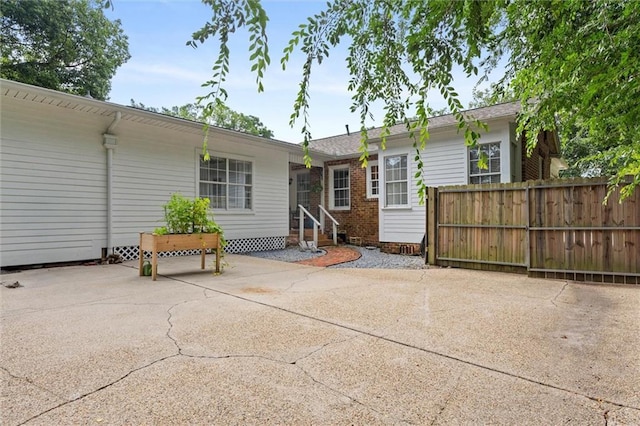 1910 Hunter Ave, Mobile, AL 36606 - rear view of property with a patio area and entry steps