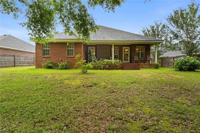 1521 Peyton Dr E, Mobile, AL 36695 - rear view of house featuring brick siding
