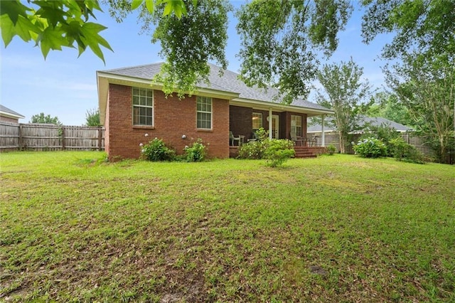 1521 Peyton Dr E, Mobile, AL 36695 - back of house with brick siding and a sunroom