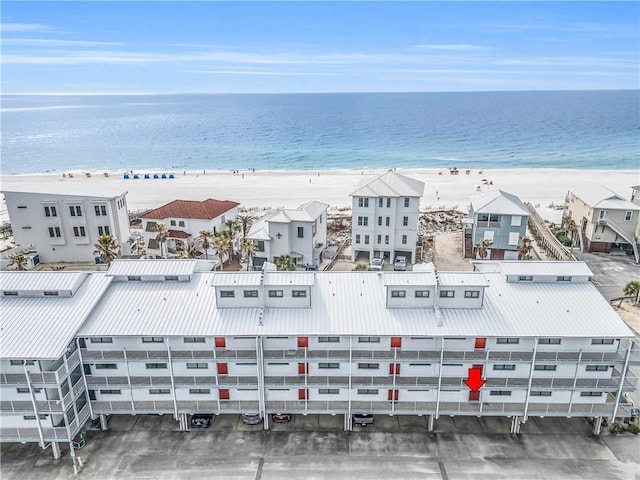 birds eye view of property featuring a view of the beach