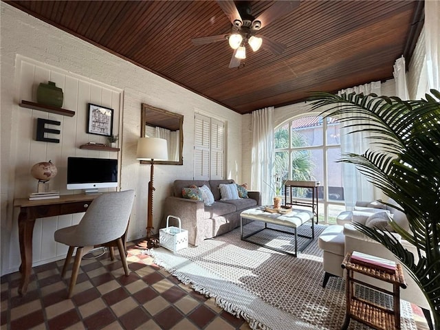 interior space with wood ceiling and ceiling fan