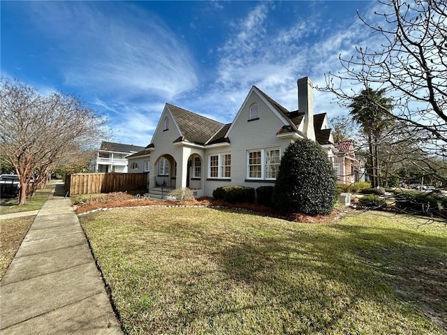 view of front of property with a front lawn