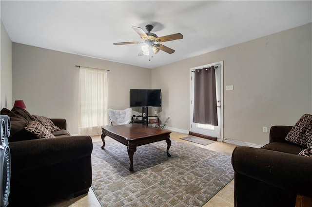 living room with ceiling fan