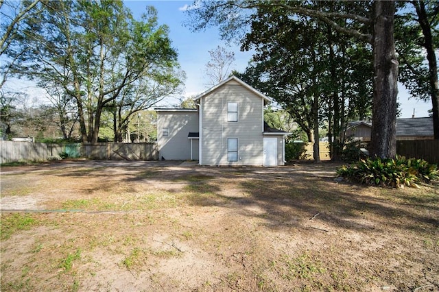 view of outbuilding featuring a yard