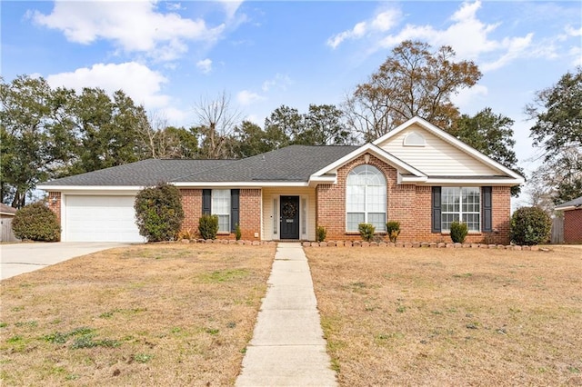 ranch-style home featuring a garage and a front yard