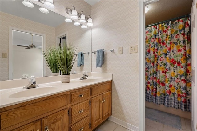 bathroom with tile patterned flooring, vanity, ceiling fan, and walk in shower