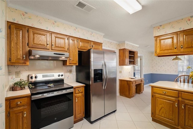 kitchen featuring crown molding, stainless steel appliances, a textured ceiling, and light tile patterned floors