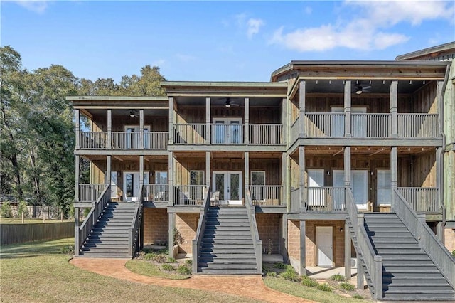 view of front of house with french doors and ceiling fan