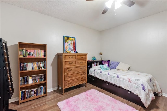 2808 Westmoor Ct, Mobile, AL 36695 - bedroom featuring wood finished floors, baseboards, and a ceiling fan