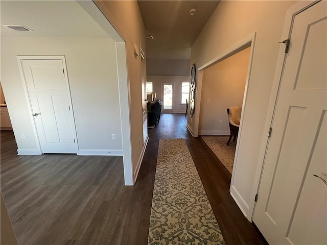 9198 Ofallon Dr N, Mobile, AL 36695 - corridor featuring dark wood finished floors and baseboards