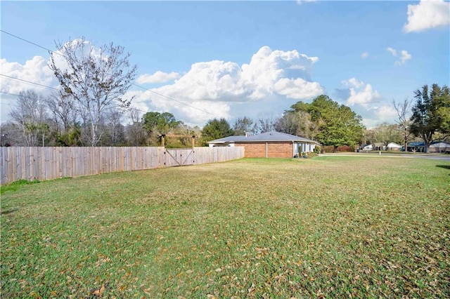 view of yard featuring fence