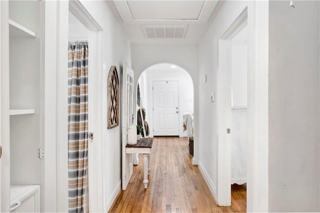 hallway featuring light wood-type flooring