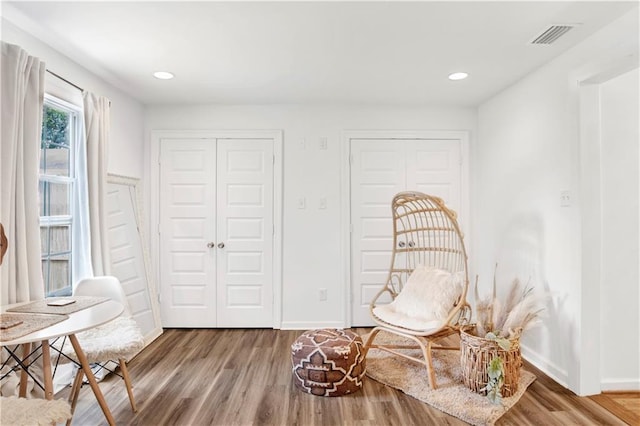 sitting room featuring hardwood / wood-style flooring