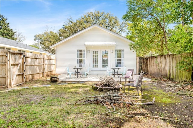 back of property featuring a patio area