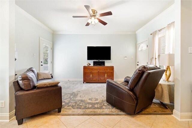 living room featuring crown molding, light tile patterned floors, and ceiling fan