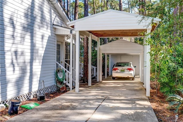 exterior space with a carport, an outdoor structure, and a garage