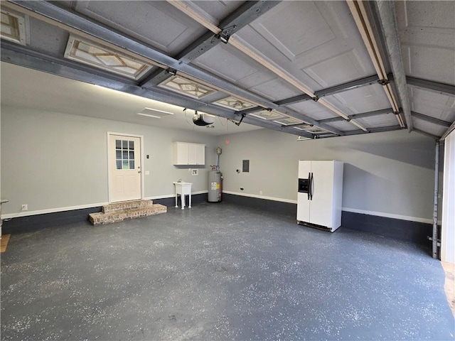 garage with electric water heater, white fridge with ice dispenser, and a garage door opener