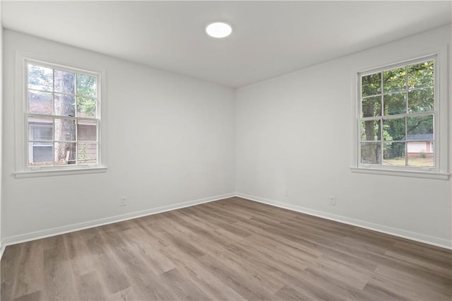 912 David Langan Dr W, Mobile, AL 36608 - unfurnished room with plenty of natural light and wood finished floors