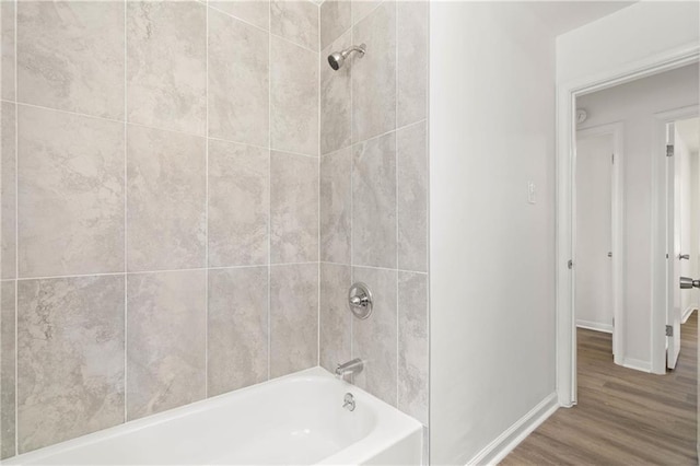 912 David Langan Dr W, Mobile, AL 36608 - bathroom featuring wood finished floors and tub / shower combination