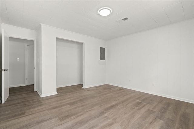 912 David Langan Dr W, Mobile, AL 36608 - unfurnished bedroom with wood finished floors, a closet, and electric panel