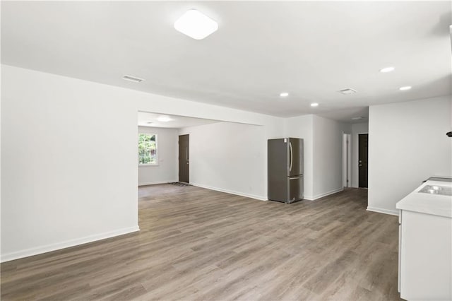 912 David Langan Dr W, Mobile, AL 36608 - unfurnished room with recessed lighting and light wood-style flooring