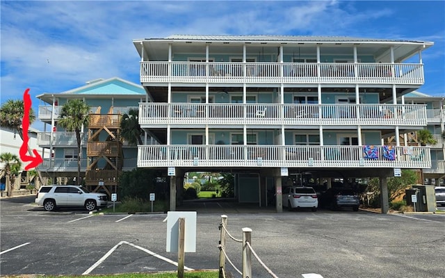 view of building exterior with a carport