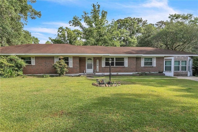 18127 County Road 10th Rd, Foley, AL 36535 - ranch-style home featuring brick siding and a front lawn
