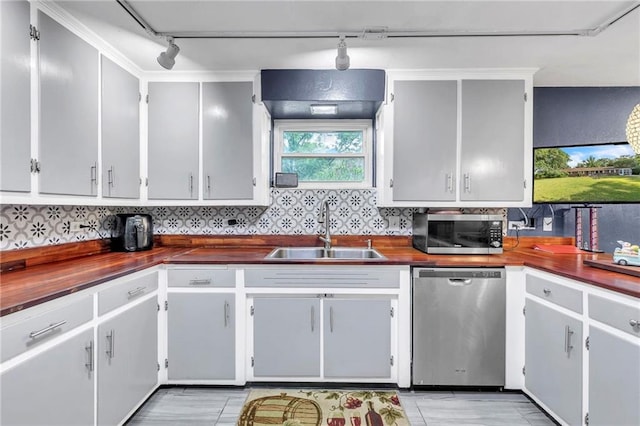 18127 County Road 10th Rd, Foley, AL 36535 - kitchen with a sink, wooden counters, stainless steel appliances, and rail lighting