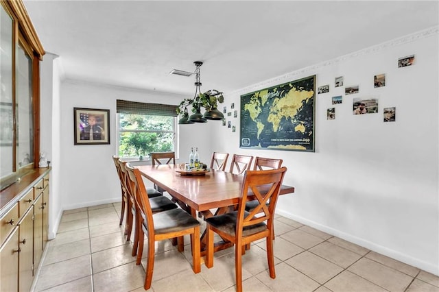 18127 County Road 10th Rd, Foley, AL 36535 - dining area with baseboards, ornamental molding, light tile patterned flooring, and visible vents
