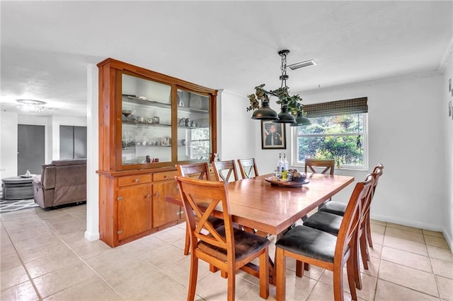 18127 County Road 10th Rd, Foley, AL 36535 - dining room with baseboards, visible vents, ornamental molding, and light tile patterned floors