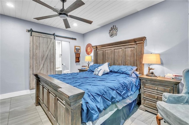 18127 County Road 10th Rd, Foley, AL 36535 - bedroom with a ceiling fan, recessed lighting, a barn door, and light tile patterned flooring