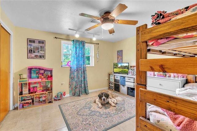 18127 County Road 10th Rd, Foley, AL 36535 - tiled bedroom with baseboards, ceiling fan, a closet, and rail lighting