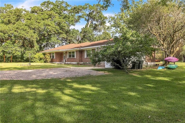 18127 County Road 10th Rd, Foley, AL 36535 - ranch-style home with brick siding and a front lawn