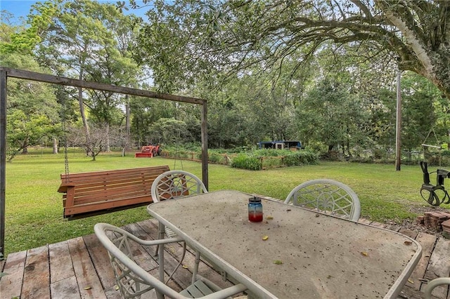 18127 County Road 10th Rd, Foley, AL 36535 - exterior space with outdoor dining area and a deck