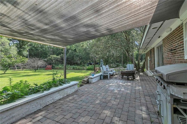 18127 County Road 10th Rd, Foley, AL 36535 - view of patio / terrace with a fire pit