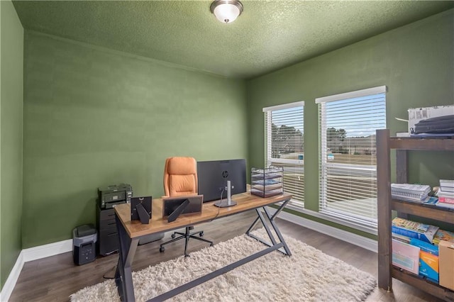 office with a textured ceiling and hardwood / wood-style flooring