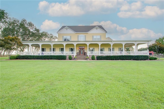 country-style home with a porch and a front yard