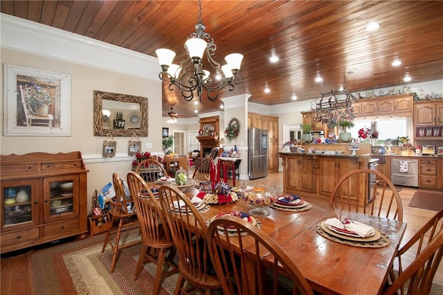 dining area with wood ceiling, light hardwood / wood-style flooring, a chandelier, and ornamental molding