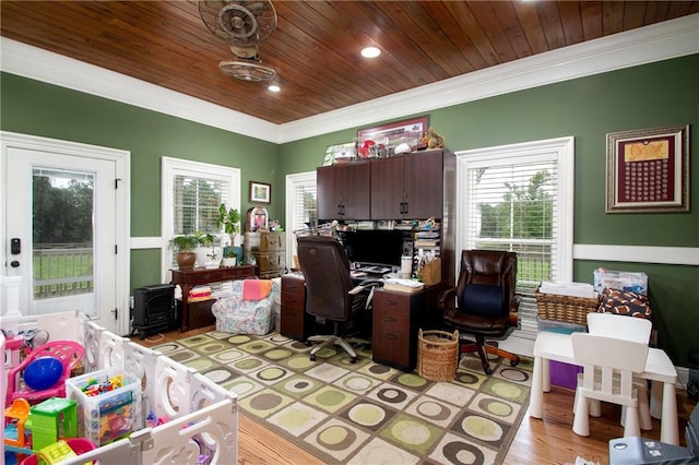 office with a wealth of natural light, light hardwood / wood-style floors, wooden ceiling, and crown molding