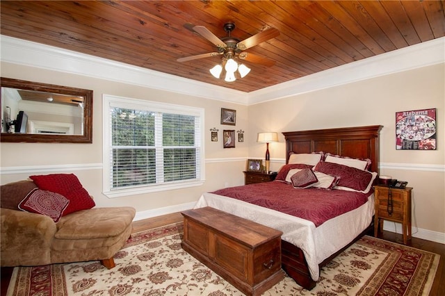 bedroom featuring light hardwood / wood-style flooring, wooden ceiling, and ornamental molding