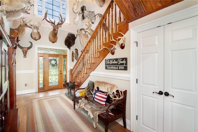 foyer with wooden ceiling and wood-type flooring