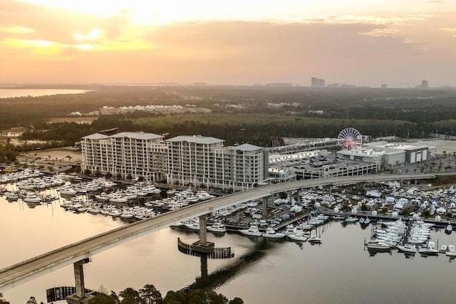 aerial view at dusk with a water view