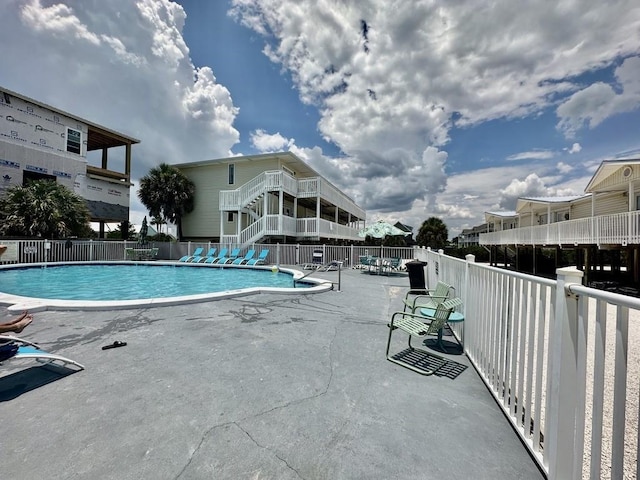 view of pool featuring a patio area