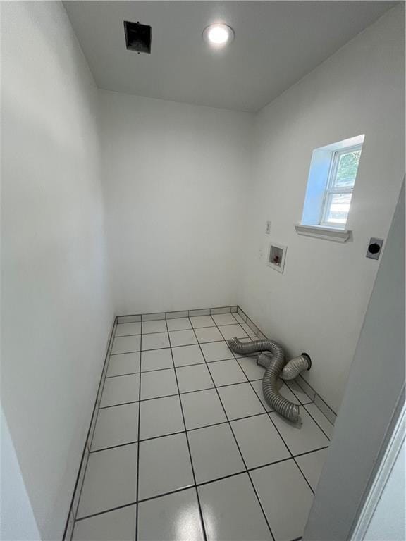laundry area with light tile patterned flooring, recessed lighting, hookup for a washing machine, electric dryer hookup, and laundry area