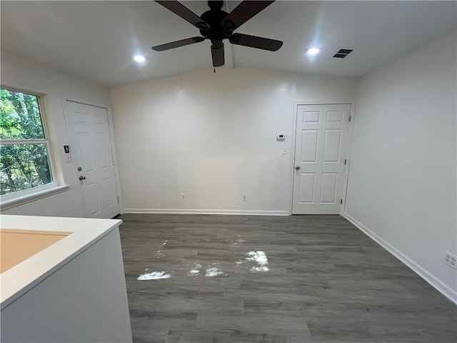 interior space with wood finished floors, ceiling fan, baseboards, visible vents, and recessed lighting