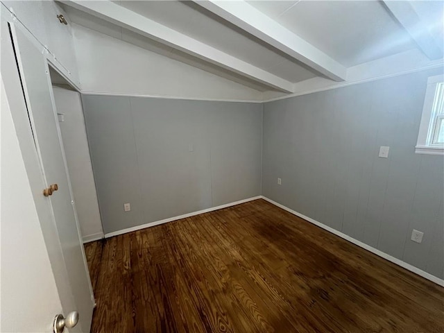 bonus room with baseboards, wood finished floors, and vaulted ceiling with beams